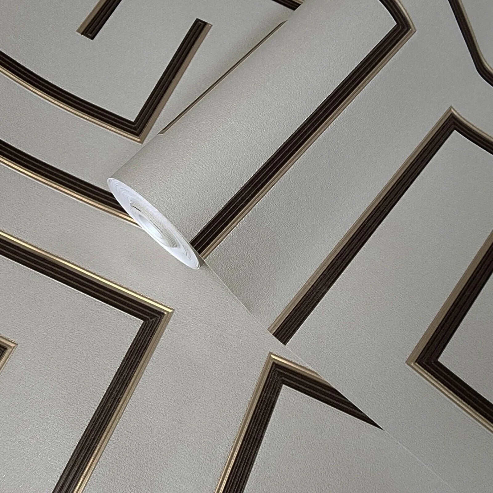 Roll of wallpaper with geometric pattern on a light gray background