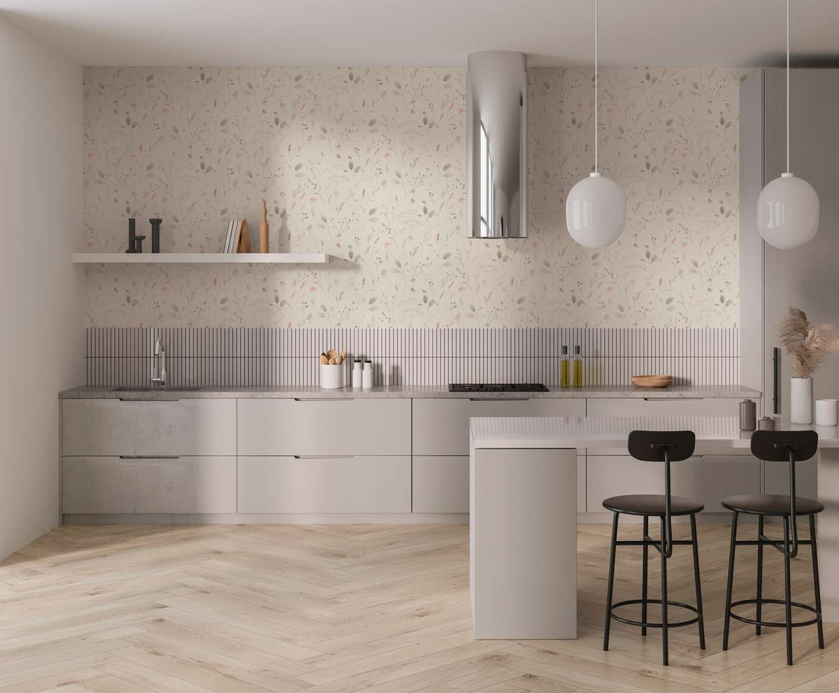 AS Creation Cosiness 792401 kitchen with Green, Grey, Pink floral wallpaper behind light cabinetry and an island.