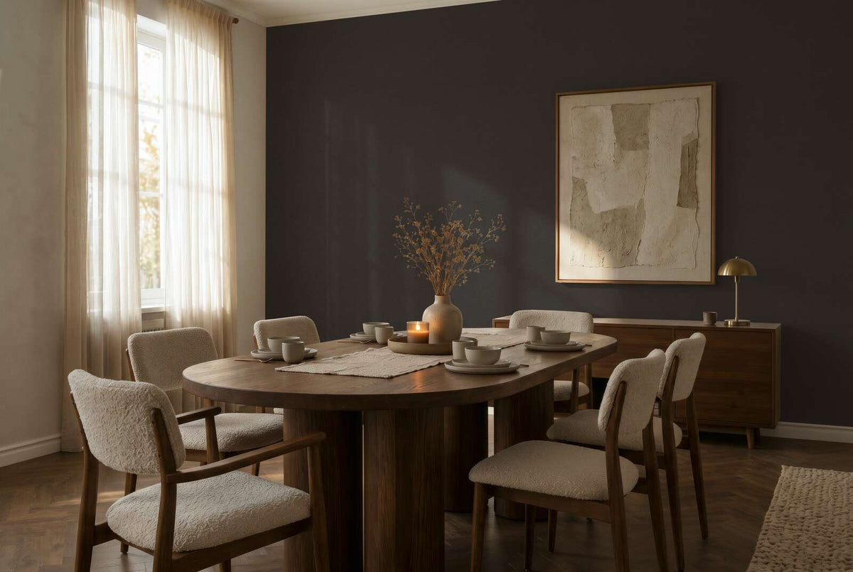 AS Creation Cosiness 792432 dining room with solid Black wallpaper on a feature wall, shown with a wooden dining table and upholstered chairs.