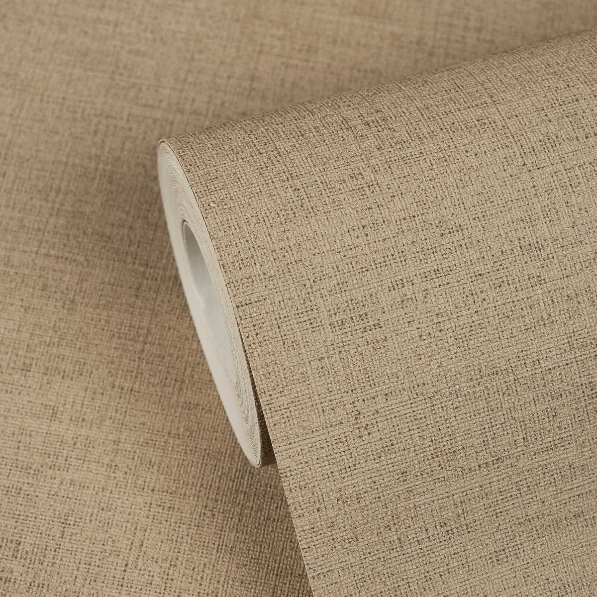 AS Creation Cosiness 792434 brown, Grey wallpaper roll with a fine crosshatch, fabric like pattern, shown partially unrolled.