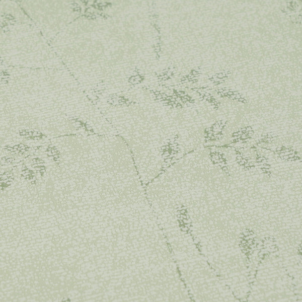 AS Creation Cosiness 792833 beige and brown speckled wallpaper with delicate leaf silhouettes forming a subtle botanical pattern close up showing the surface texture and pattern detail.