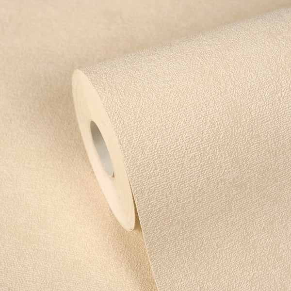 AS Creation Cosiness 792843 close up of a textured wallpaper roll in the Beige, Brown, Cream colorway, resting on an unrolled sheet of the same design.