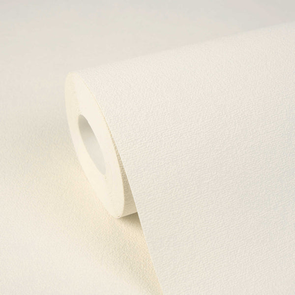 AS Creation Cosiness 792844 close up of a Cream wallpaper roll with a fine, subtle texture resting on a matching sheet.