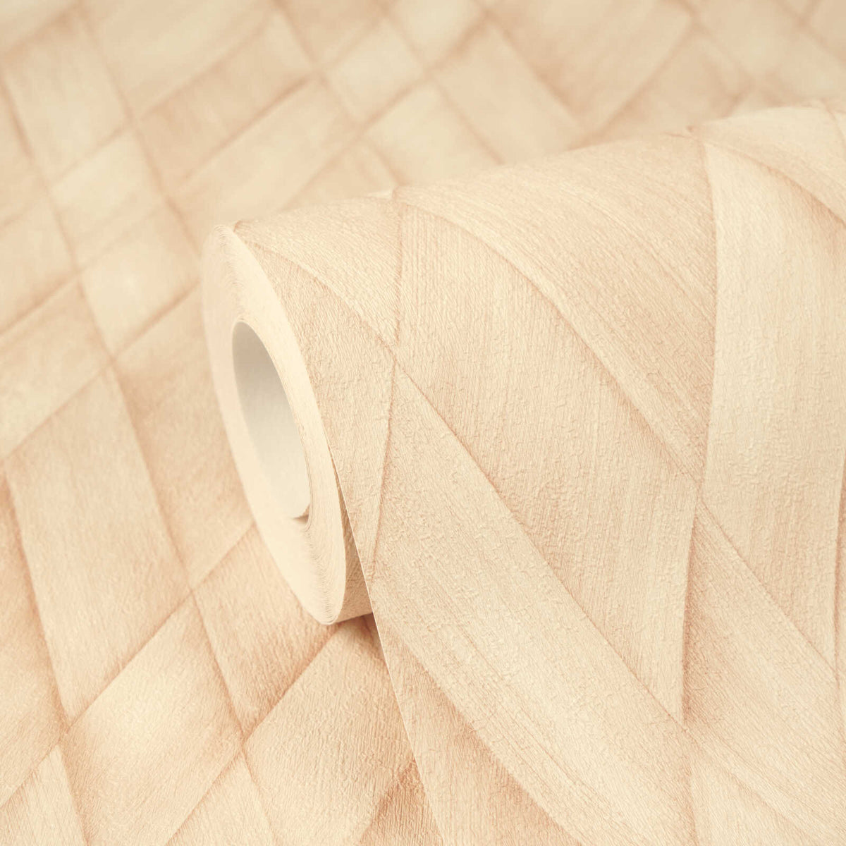 AS Creation Cosiness 793133 close up of a wallpaper roll on matching unrolled paper, showing a Beige and Cream geometric pattern of overlapping diagonal bands.