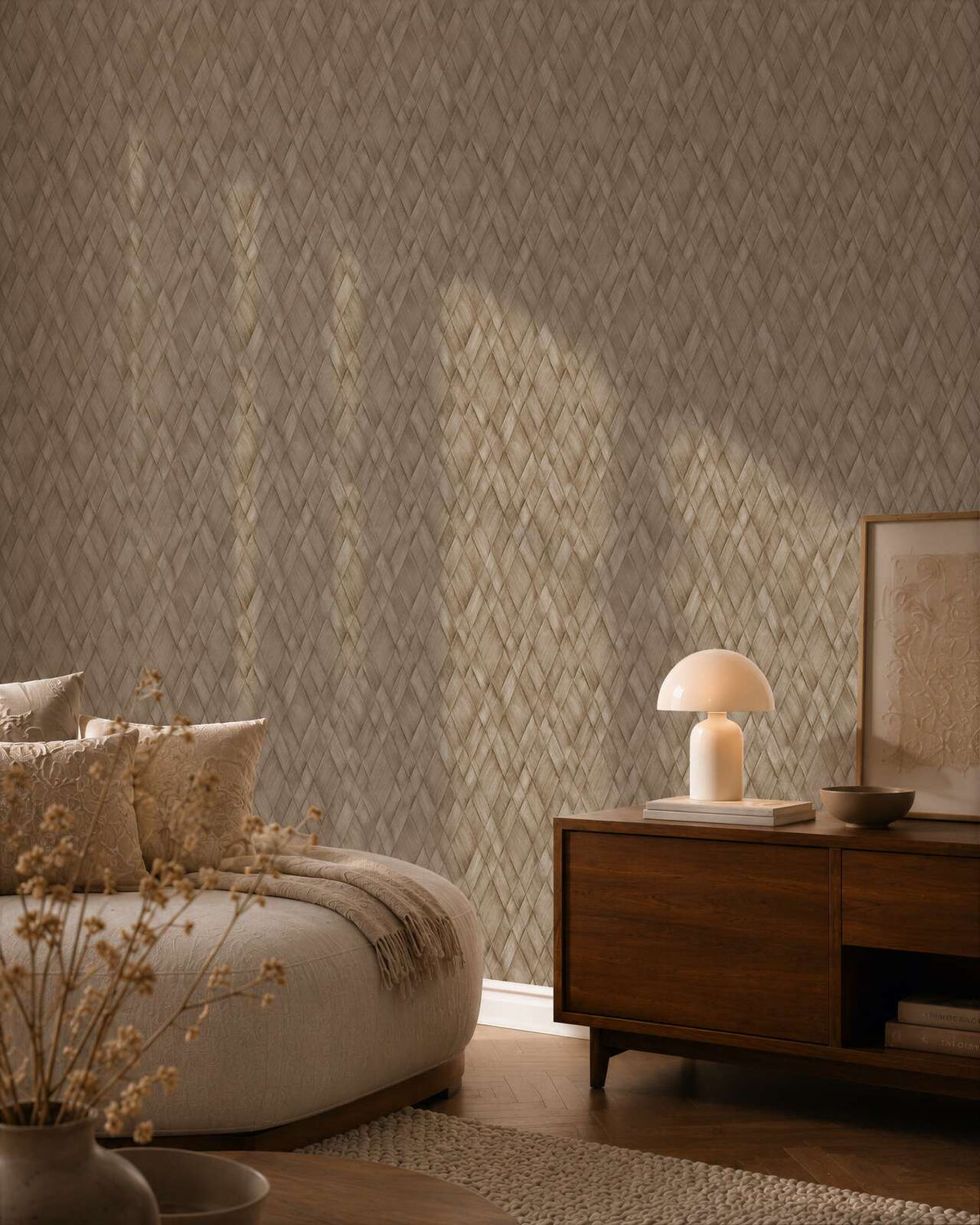 AS Creation Cosiness 793134 bedroom with Brown woven look diamond pattern wallpaper behind a low bed and a table lamp.