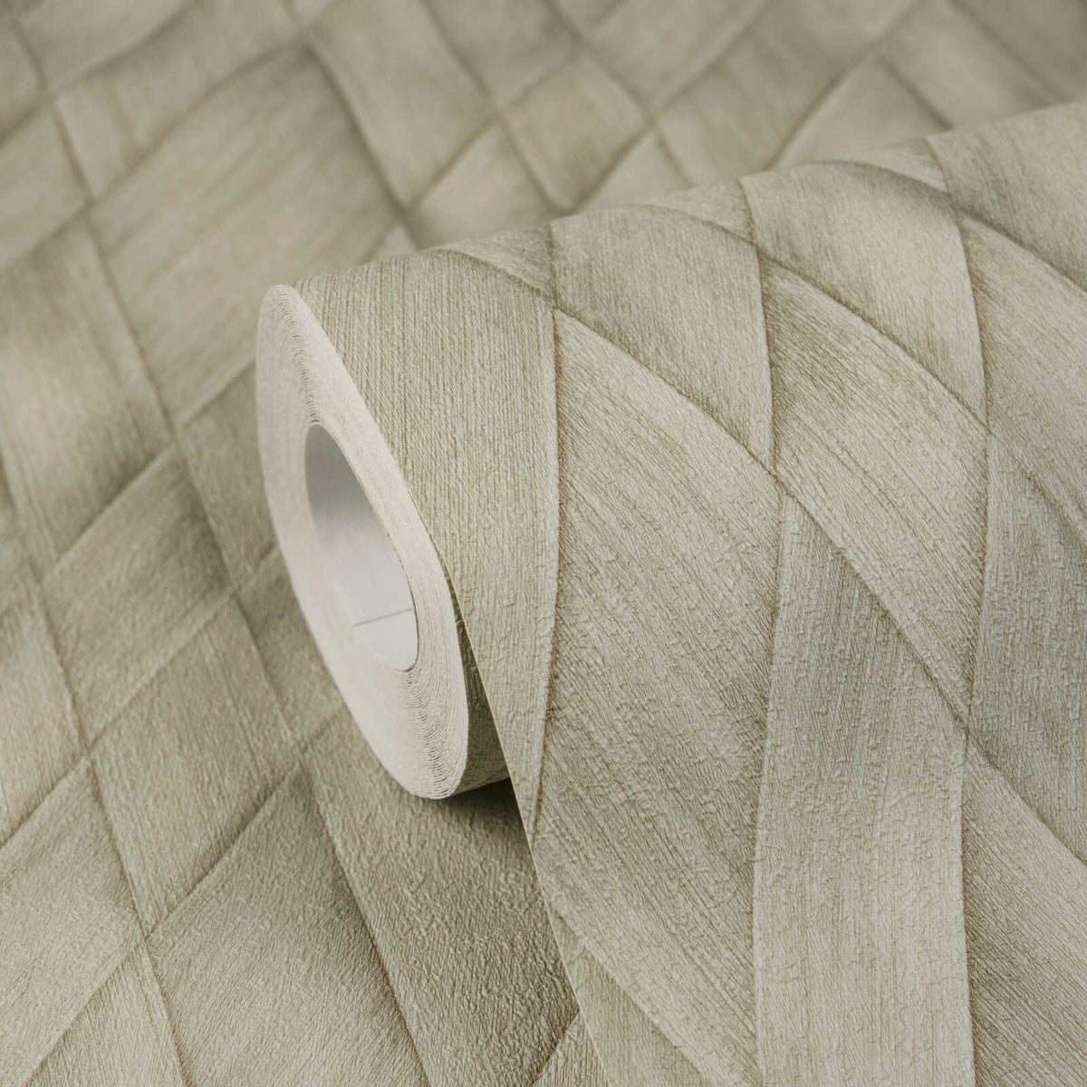 AS Creation Cosiness 793136 green wallpaper roll resting on an unrolled sheet that shows a subtly textured geometric diamond pattern.