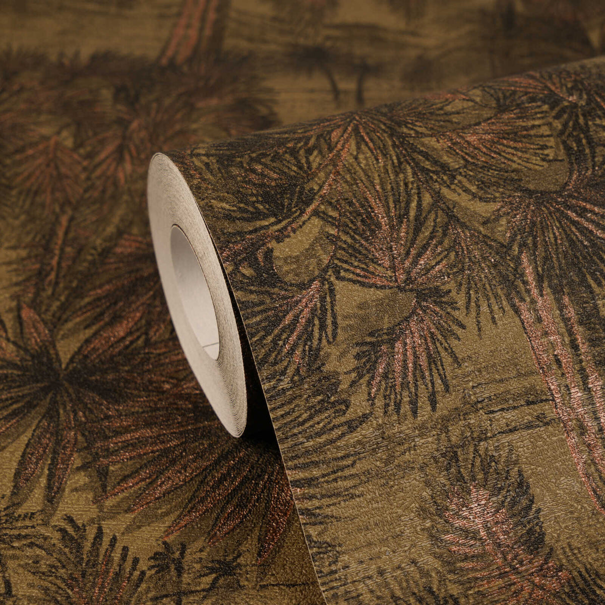 AS Creation Cosiness 793174 close up of a wallpaper roll showing a palm leaf pattern in Brown and Metallic.