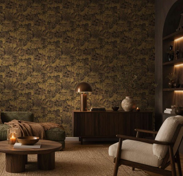 AS Creation Cosiness 793174 living room with brown, metallic wallpaper featuring an illustrated tropical landscape, shown behind a sofa and a sideboard.