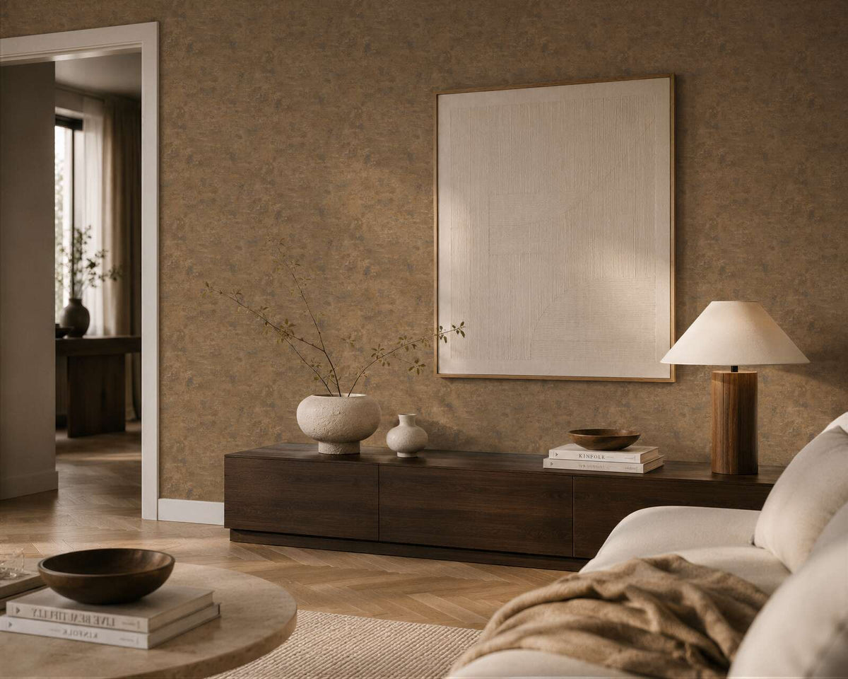 AS Creation Cosiness 793182 living room with Brown, Metallic, and Orange mottled wallpaper behind a low console and a sofa.