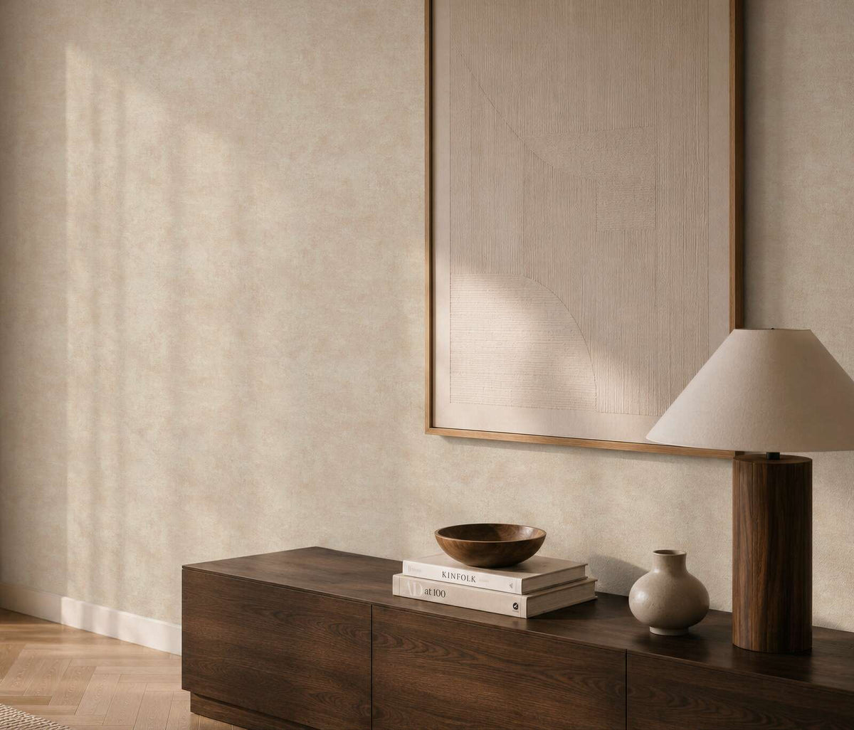 AS Creation Cosiness 793183 living room with cream and metallic wallpaper behind a wooden console and a table lamp.