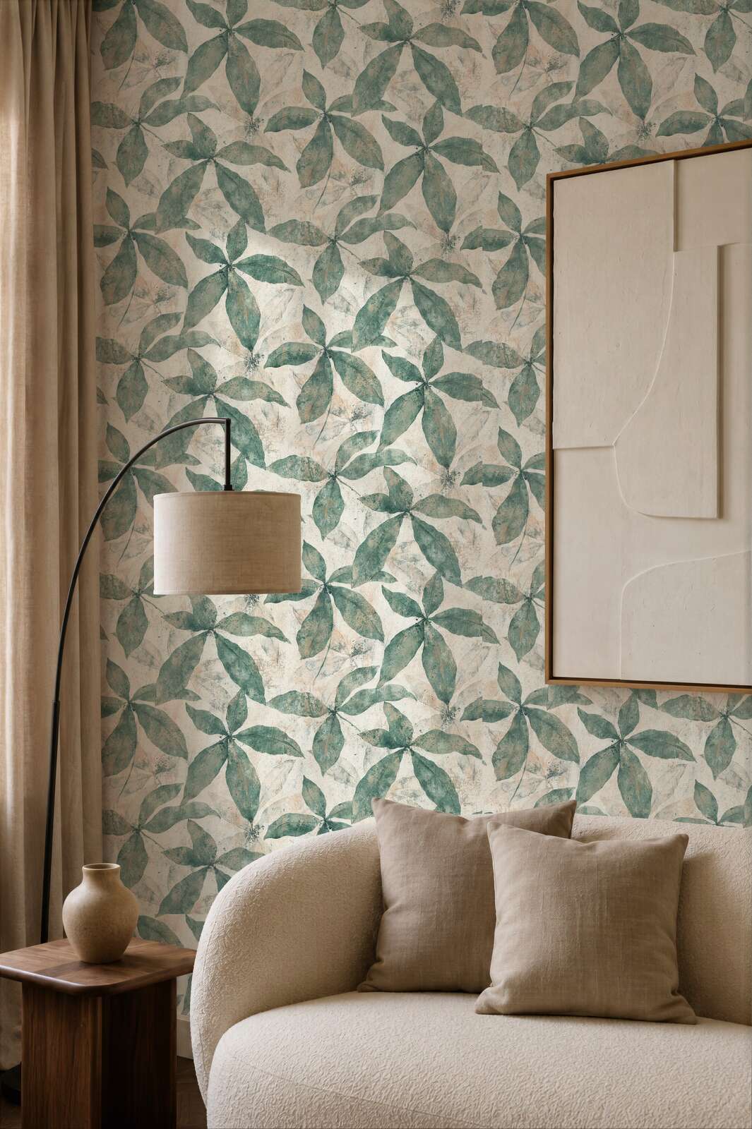 AS Creation Cosiness 793201 large overlapping leaf clusters arranged in radial motifs on a mottled ground wallpaper on a living room feature wall.
