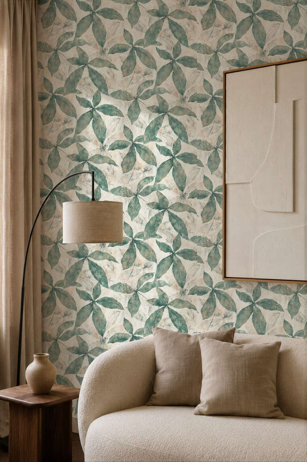 AS Creation Cosiness 793201 large overlapping leaf clusters arranged in radial motifs on a mottled ground wallpaper on a living room feature wall.