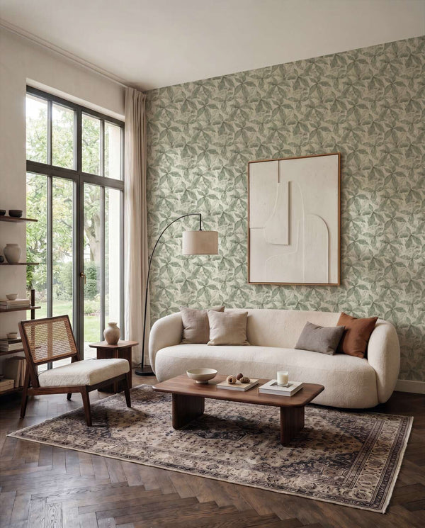 AS Creation Cosiness 793202 repeating leaf like geometric pattern in Cream and Green wallpaper on a living room feature wall.