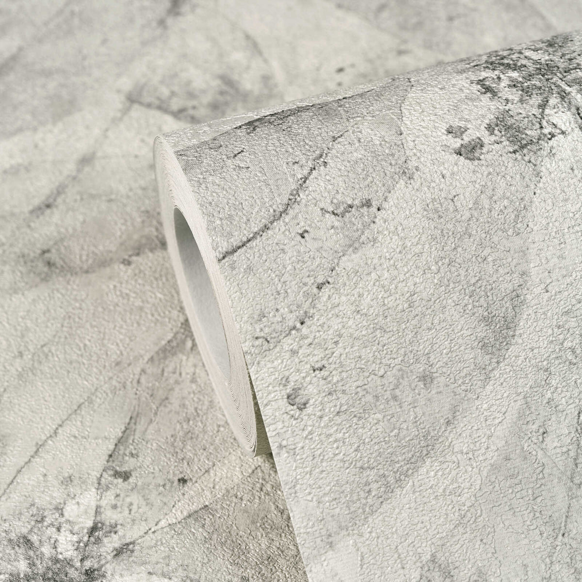 AS Creation Cosiness 793203 close up of a Grey wallpaper roll on matching unrolled, showing an abstract textured pattern with soft curved lines.