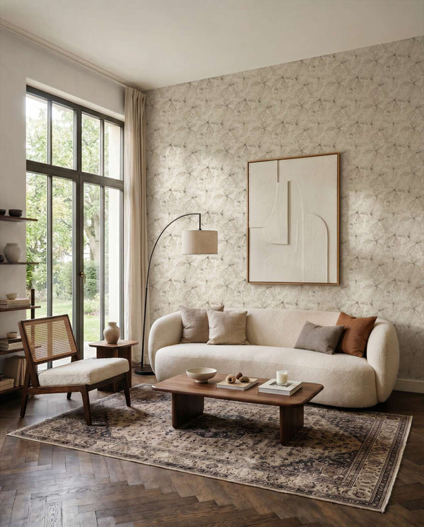 AS Creation Cosiness 793204 living room with Beige and Cream patterned wallpaper, a curved sofa and a wooden coffee table.