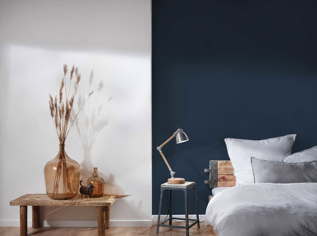 AS Creation French Affair 356536 close up of Blue wallpaper with subtle fine grain texture.