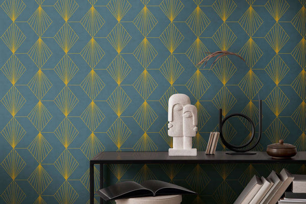 AS Creation French Affair 361561 blue wallpaper with a metallic geometric fan and diamond pattern behind a console shelf holding a sculptural bust, books, and decor.