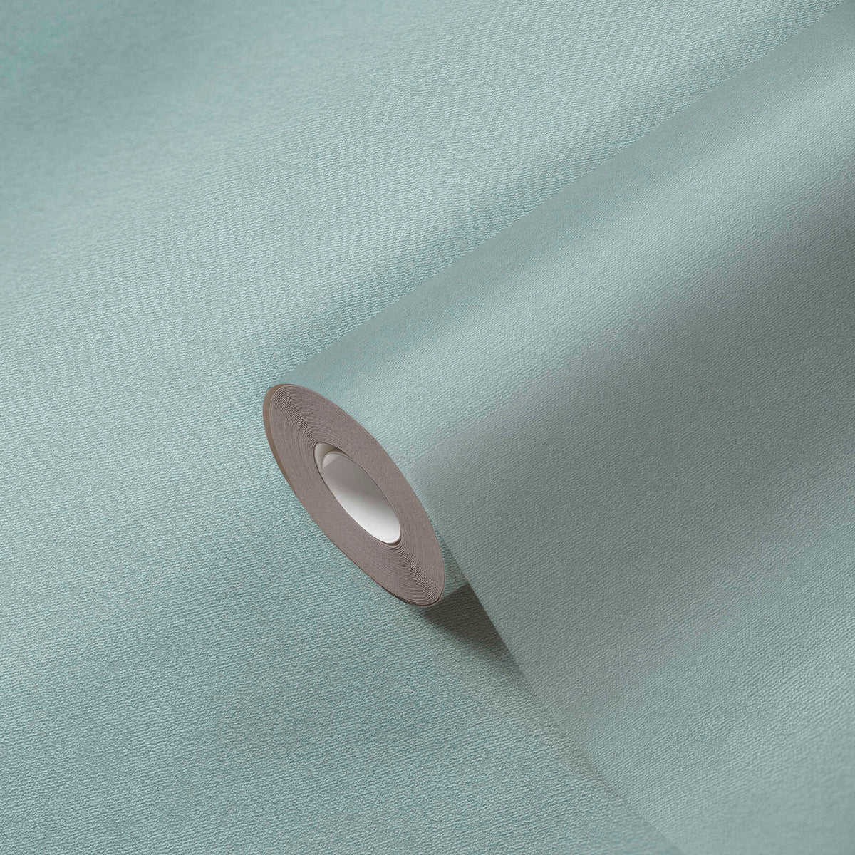 AS Creation French Affair 393418 textured wallpaper roll in the Blue, Green, Turquoise colorway, partially unrolled on a matching surface.