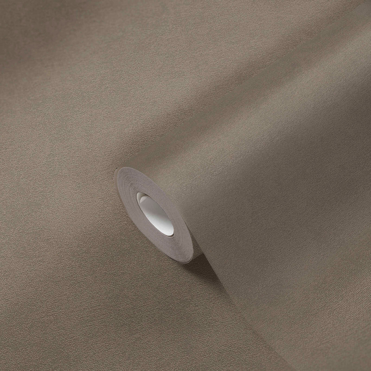 AS Creation French Affair 393419 wallpaper roll in Brown with a subtle fine texture shown on a matching unrolled sheet.