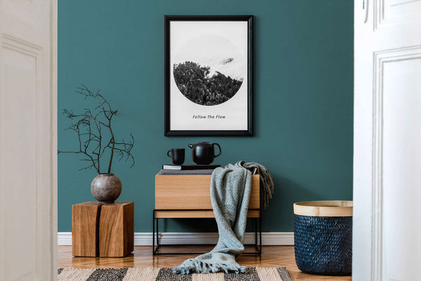 AS Creation French Affair 395764 living room with Blue, Green wallpaper behind a wooden console and framed wall art.