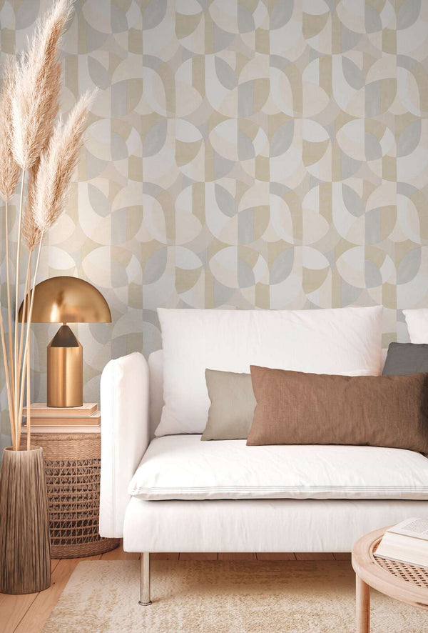 AS Creation French Affair 399324 living room with geometric Beige, Cream, Grey wallpaper behind a white sofa and a metallic table lamp.