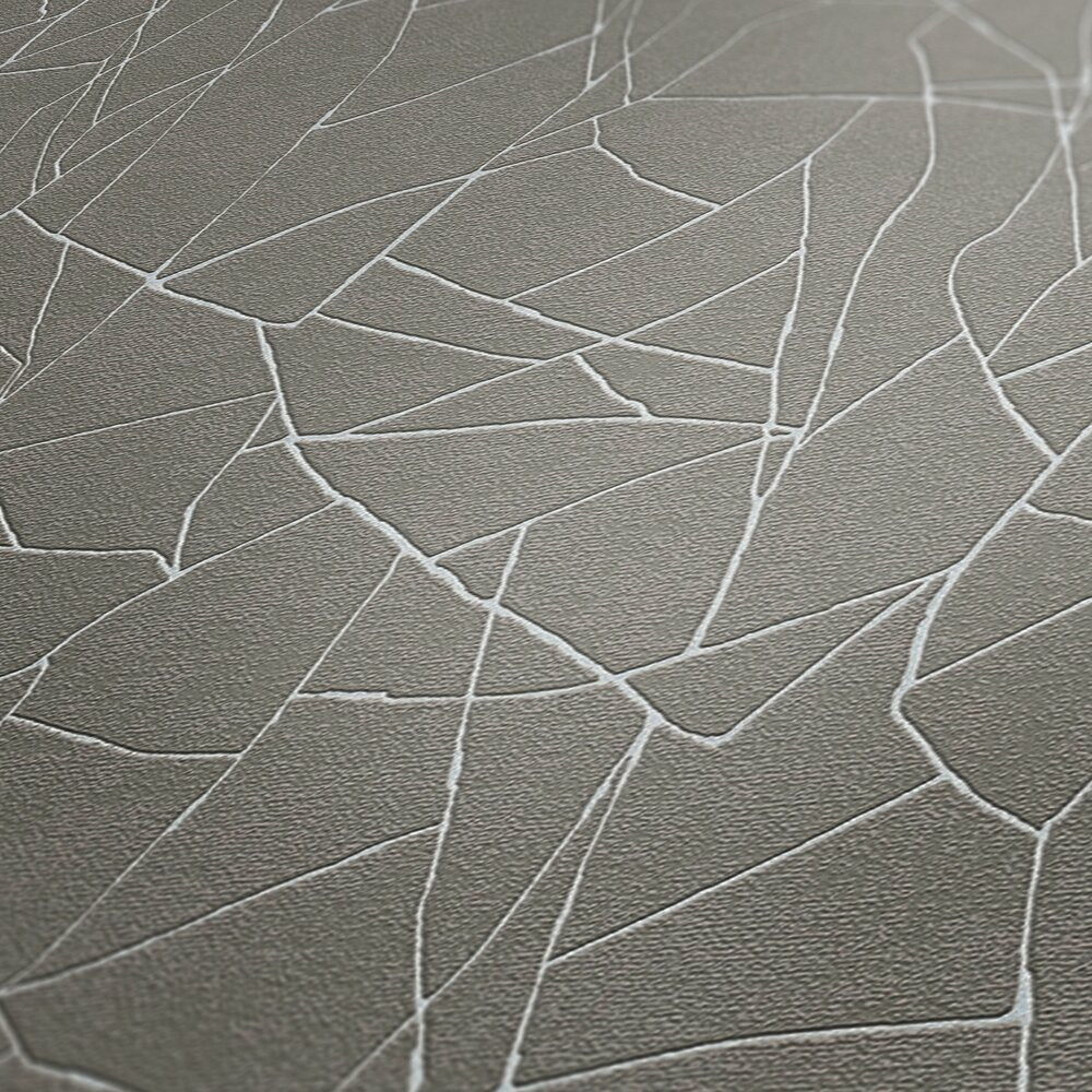 AS Creation French Affair 399343 close up of Grey wallpaper with intersecting White angular lines.