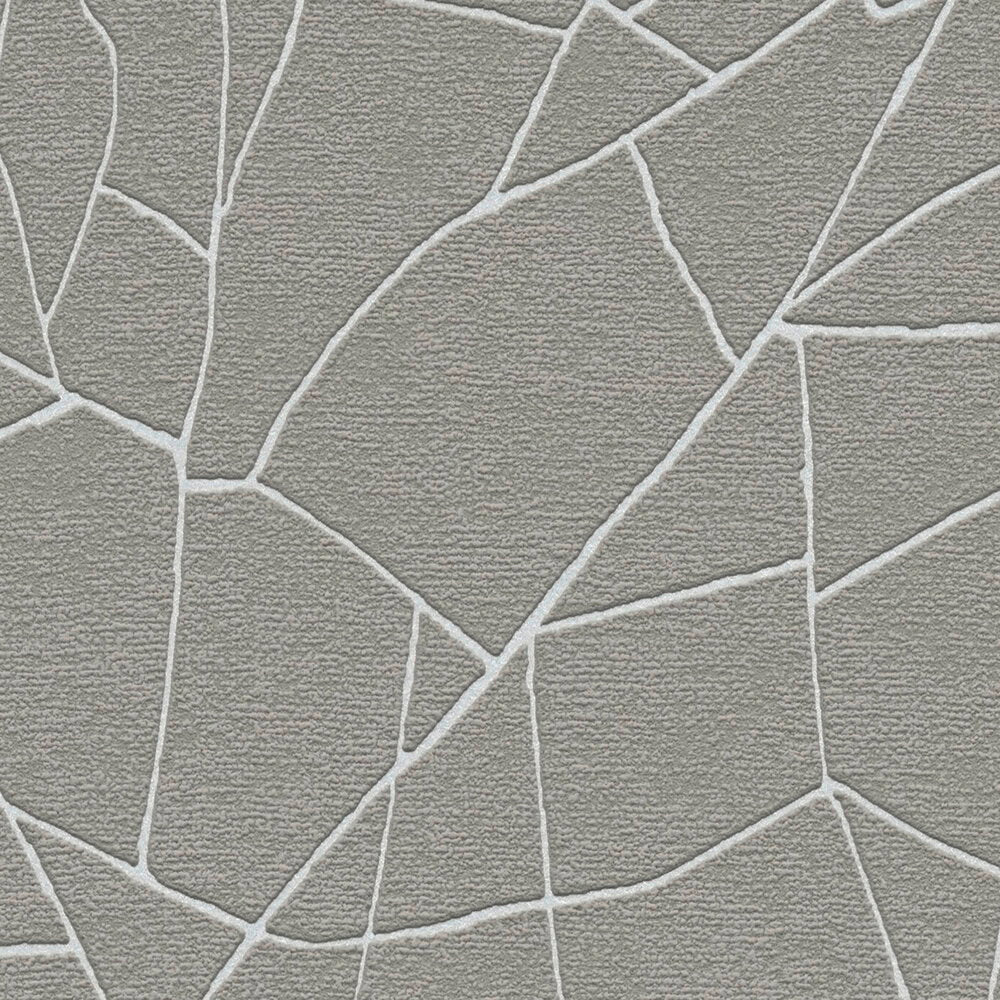 AS Creation French Affair 399343 grey and White wallpaper with irregular shard like geometric lines and a textured surface, shown in close up.