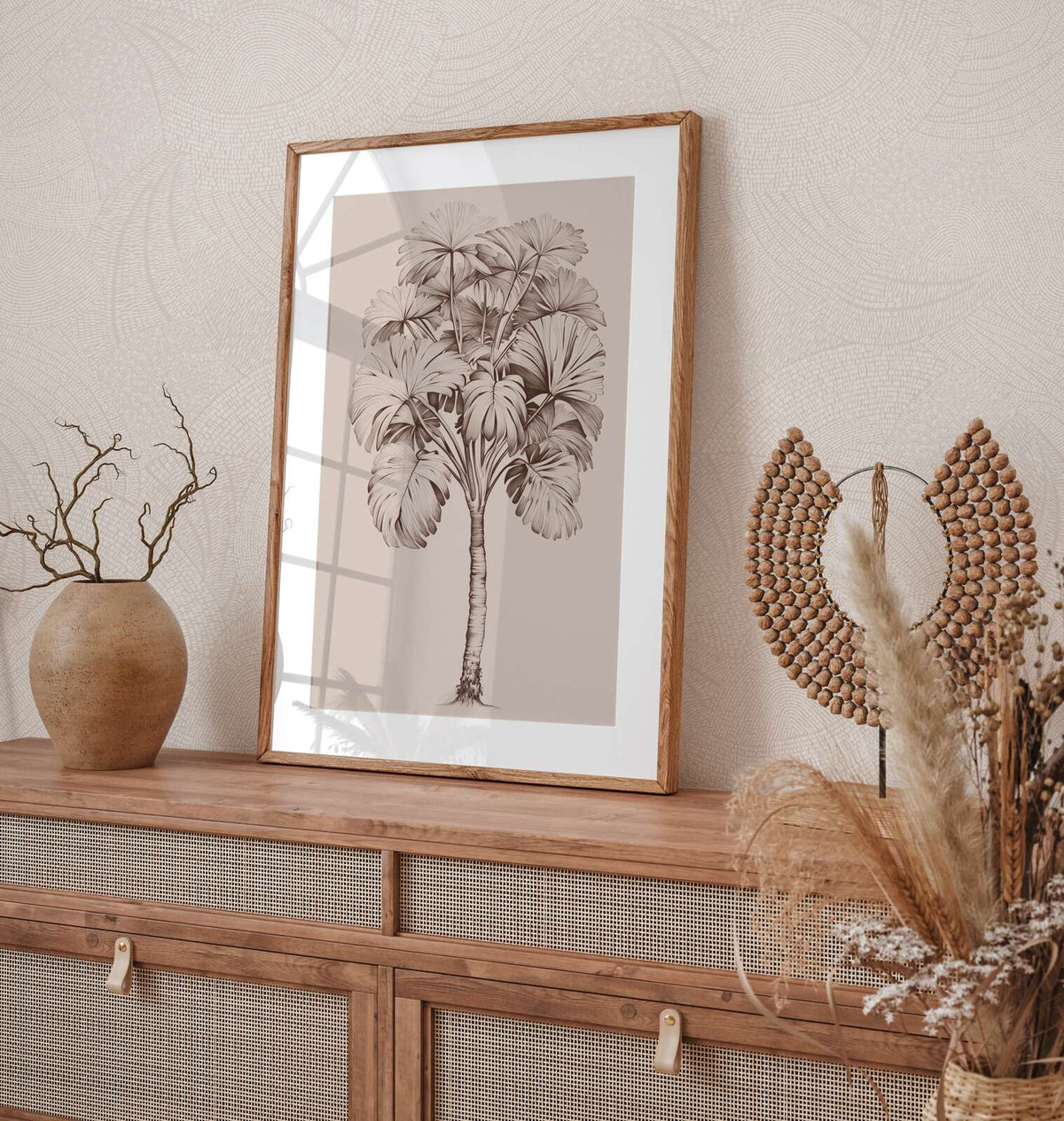 AS Creation French Affair 399351 grey and White wallpaper with a delicate curved line pattern behind a wooden console, framed botanical art, a ceramic vase, and a beaded decor piece.