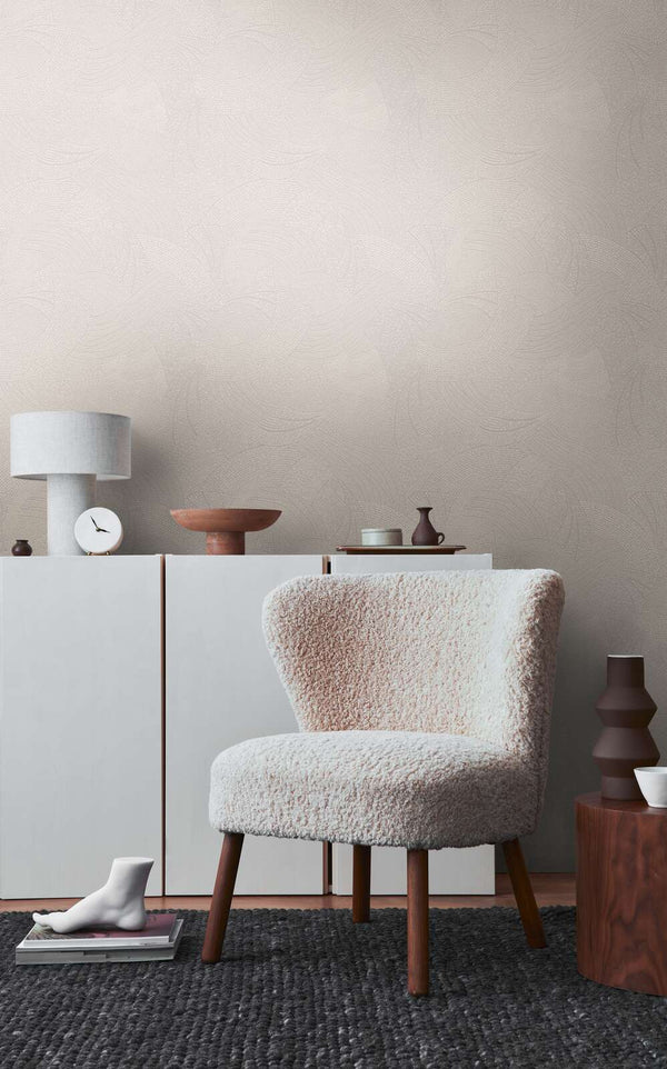 AS Creation French Affair 399351 living room with Grey, White wallpaper featuring a subtle abstract pattern, shown behind a lounge chair and a low sideboard.