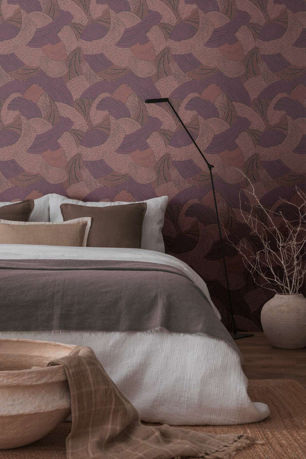 AS Creation French Affair 399352 red abstract pattern wallpaper in a bedroom with a bed and floor lamp.