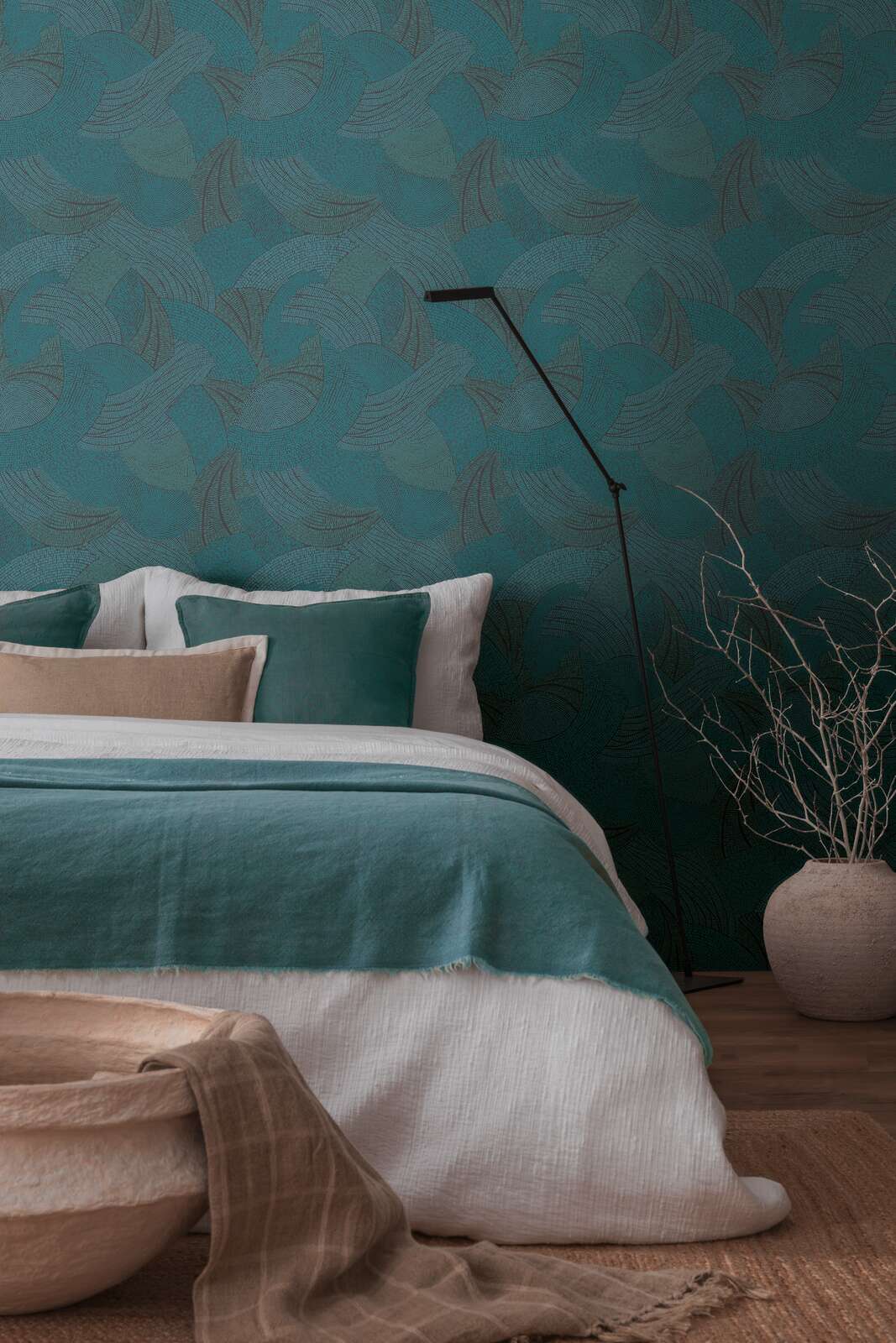 AS Creation French Affair 399353 bedroom with Black, Blue, Green, Turquoise wallpaper featuring an abstract curved motif; a bed and a floor lamp are visible.