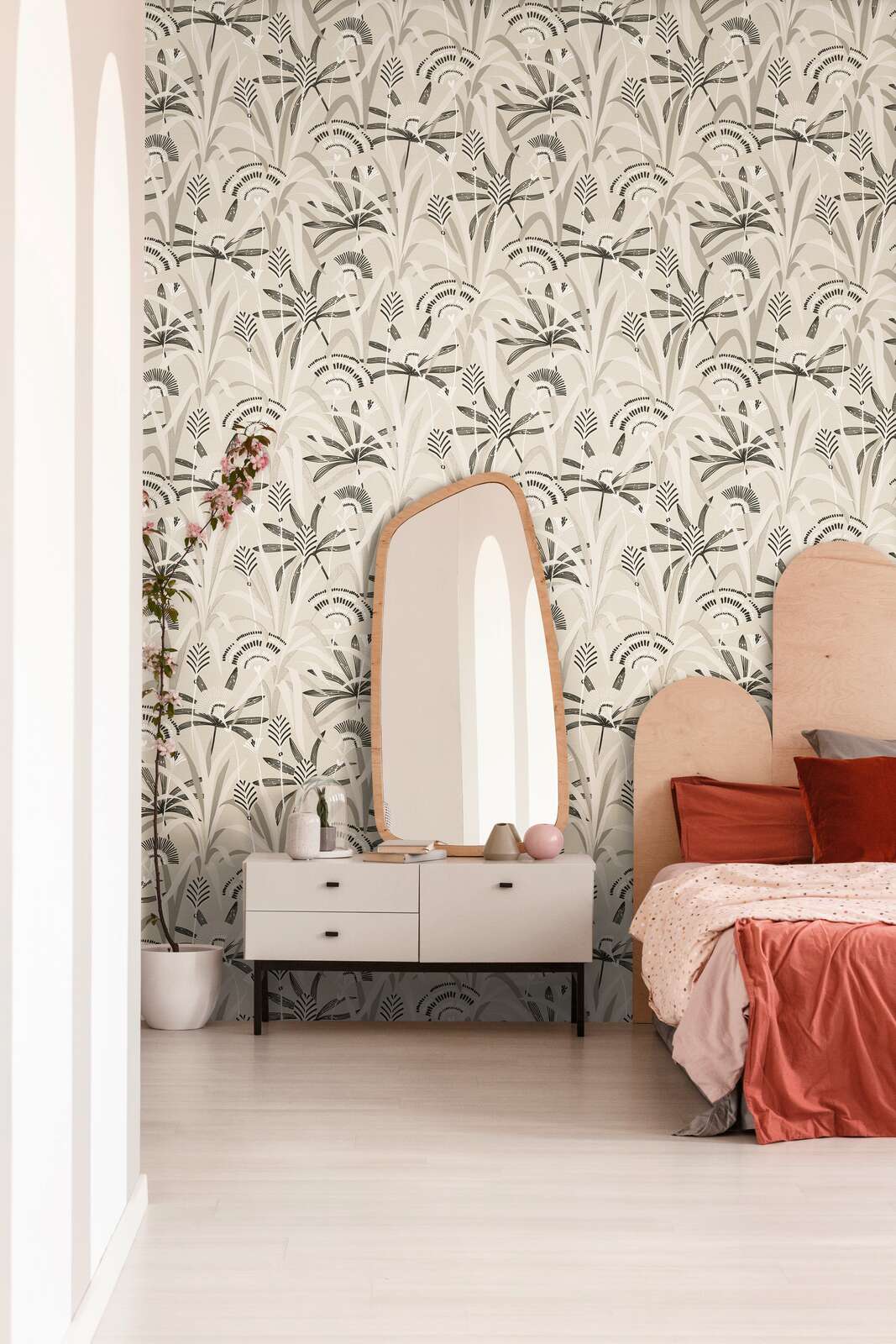 AS Creation French Affair 399361 bedroom with botanical pattern wallpaper, featuring a dresser with mirror and a bed.