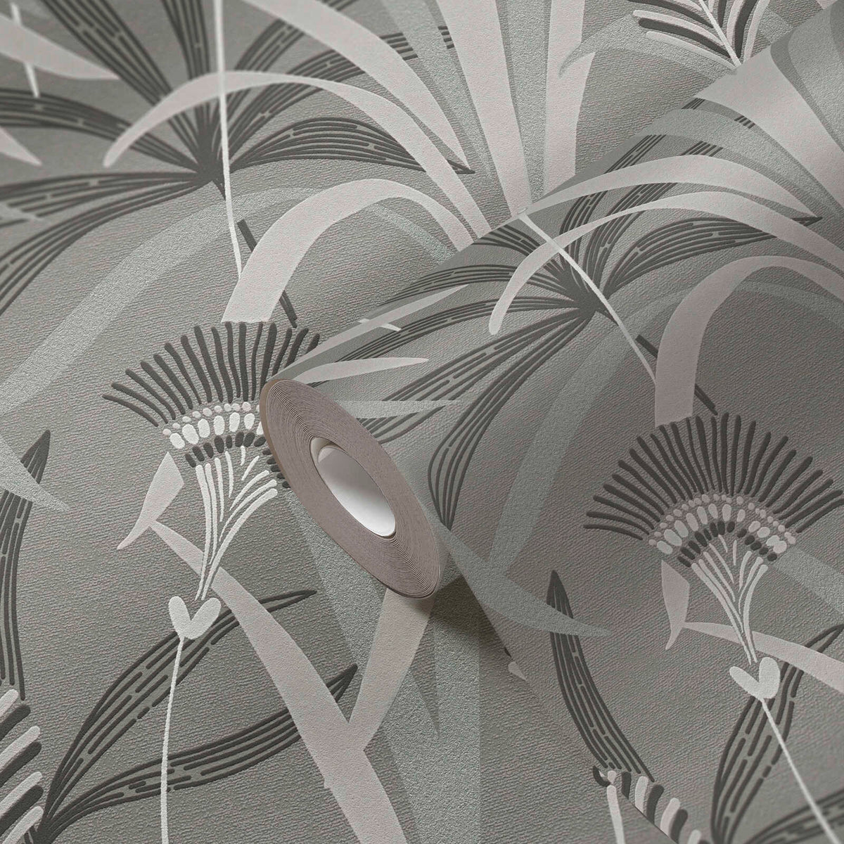 AS Creation French Affair 399362 stylized botanical pattern with layered leaves and fan like flower heads in the Black, Grey, Turqouq wallpaper roll showing its textured surface and finish.