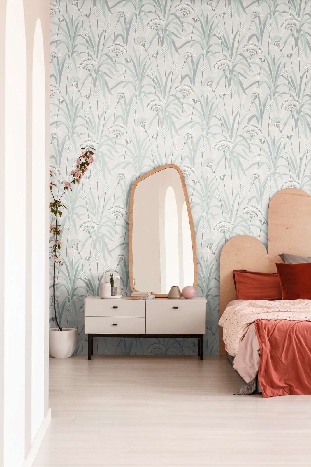 AS Creation French Affair 399363 bedroom with Green, Grey, Turquoise, and White botanical wallpaper behind a dresser and bed.
