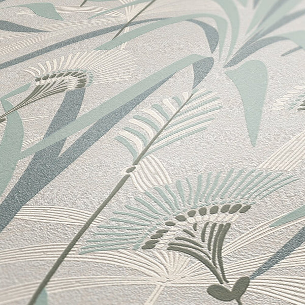 AS Creation French Affair 399363 close up of embossed botanical wallpaper showing stylized leaves and fronds in Green, Grey, Turquoise, and White.