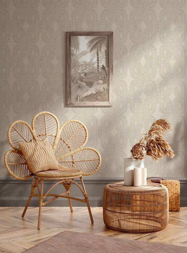 AS Creation French Affair 399371 living room with geometric wallpaper behind a rattan chair and a round wicker table.