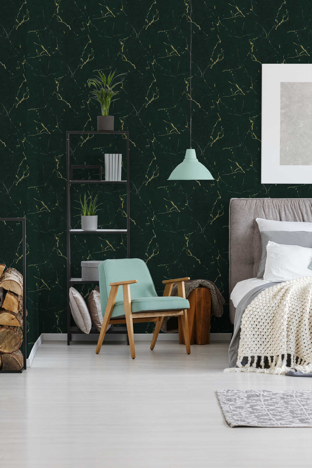 AS Creation Metropolitan Stories Ii 378555 bedroom with green wallpaper with metallic veining, shown behind a bed and an armchair.