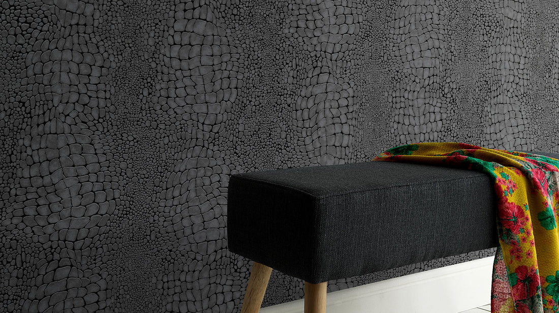 Erismann Cameo 10529-14 wallpaper in cream with an abstract, stone-like embossed pattern.