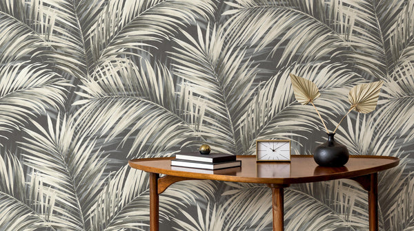 Dark room scene with the Cameo palm frond wallpaper in charcoal tones