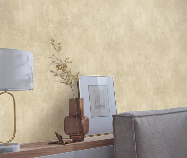 Erismann Elle Decoration 4 beige textured wallpaper with soft plaster-like finish behind a shelf and lamp