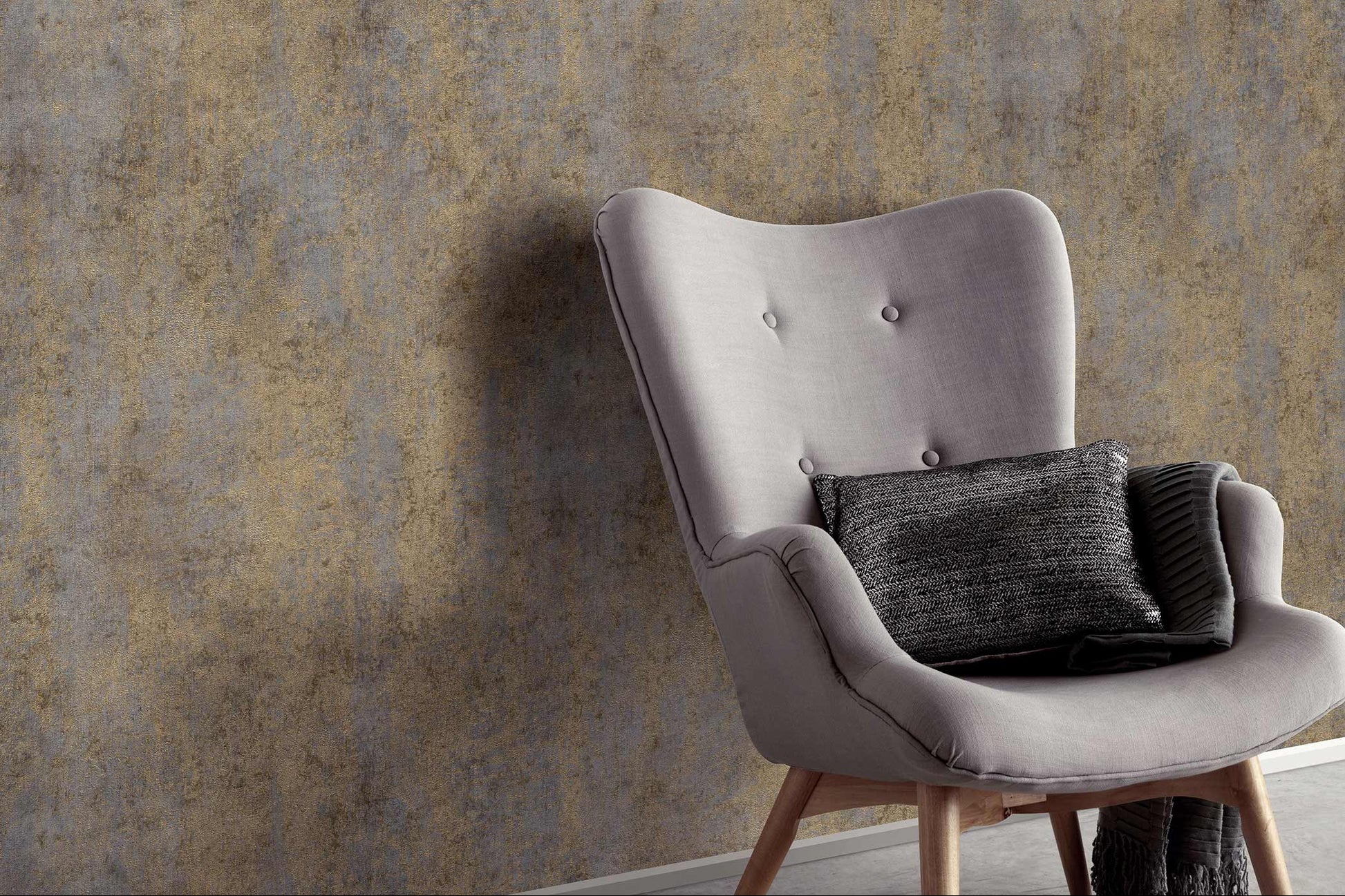 Erismann Elle Decoration 4 textured beige and taupe wallpaper in modern interior with upholstered accent chair