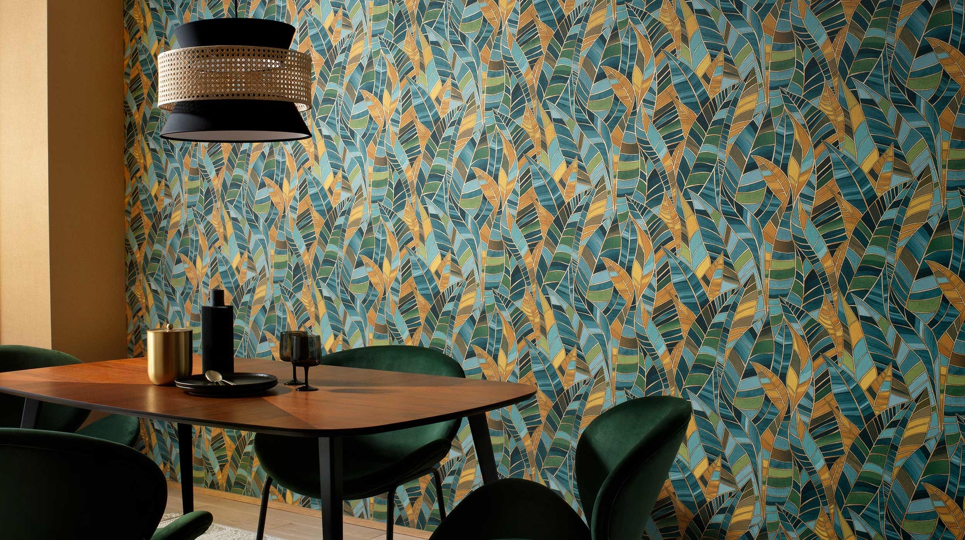 Erismann Elle Decoration 4 botanical wallpaper with teal and gold leaf pattern in modern dining interior