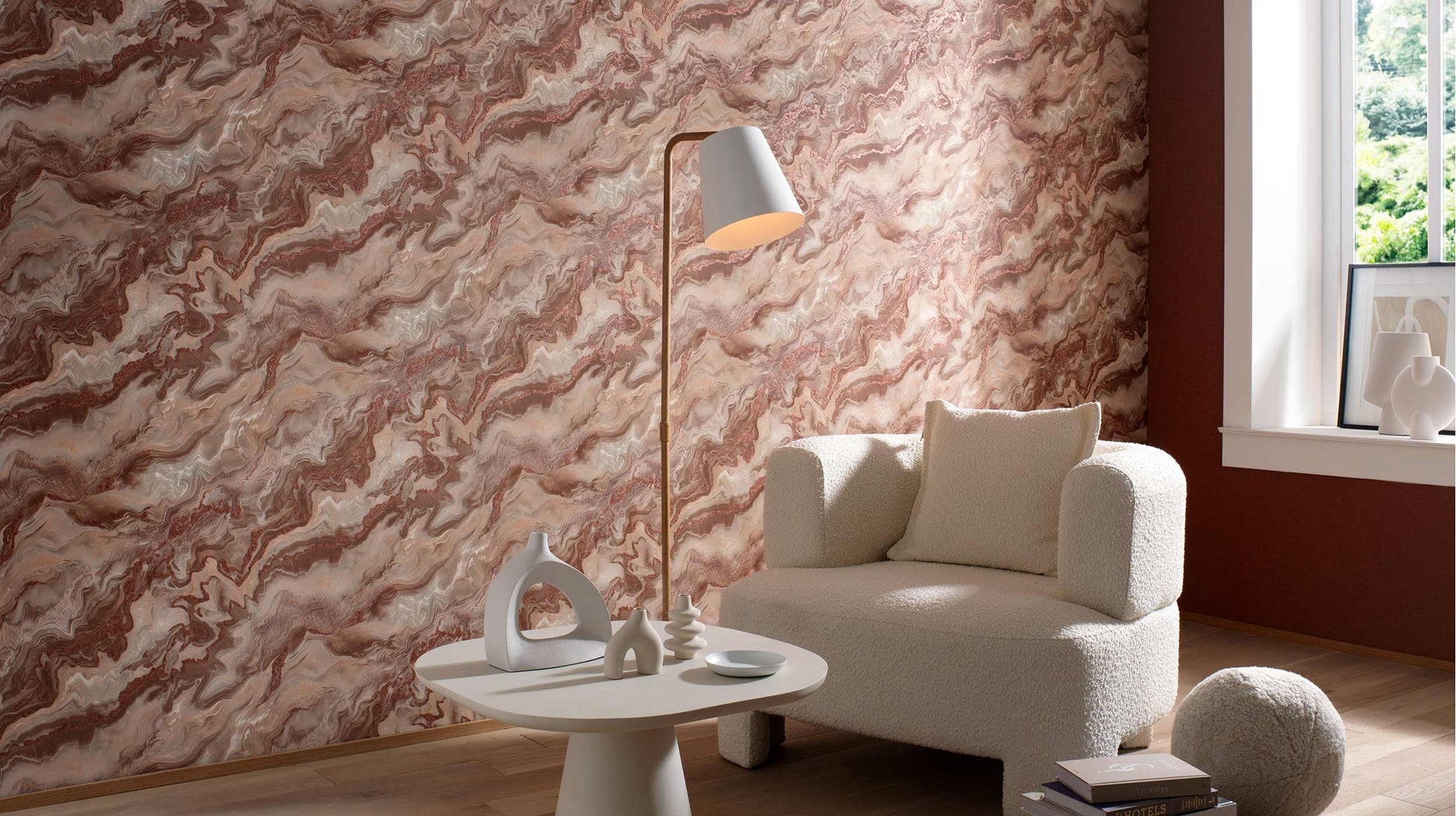 Erismann Elle Decoration 4 marble effect wallpaper in warm terracotta tones styled in a modern living room with neutral furniture