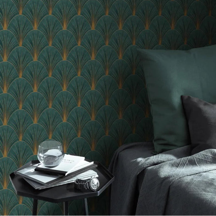 Erismann Elle Decoration Art Deco fan wallpaper in deep green and gold tones in a bedroom