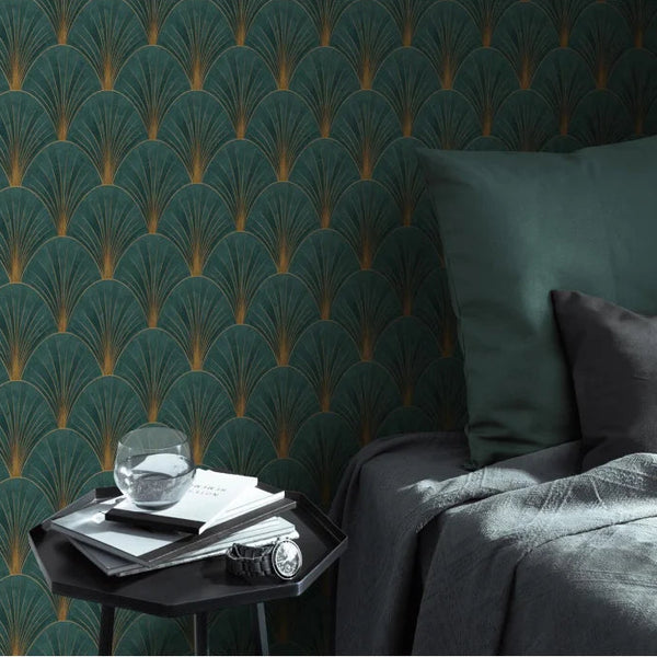Erismann Elle Decoration Art Deco fan wallpaper in deep green and gold tones in a bedroom