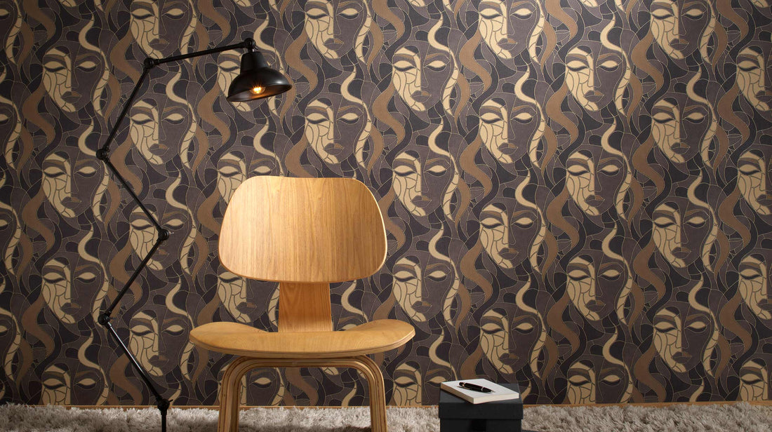 Erismann Elle Decoration abstract face wallpaper in dark brown and beige tones with Art Deco styling