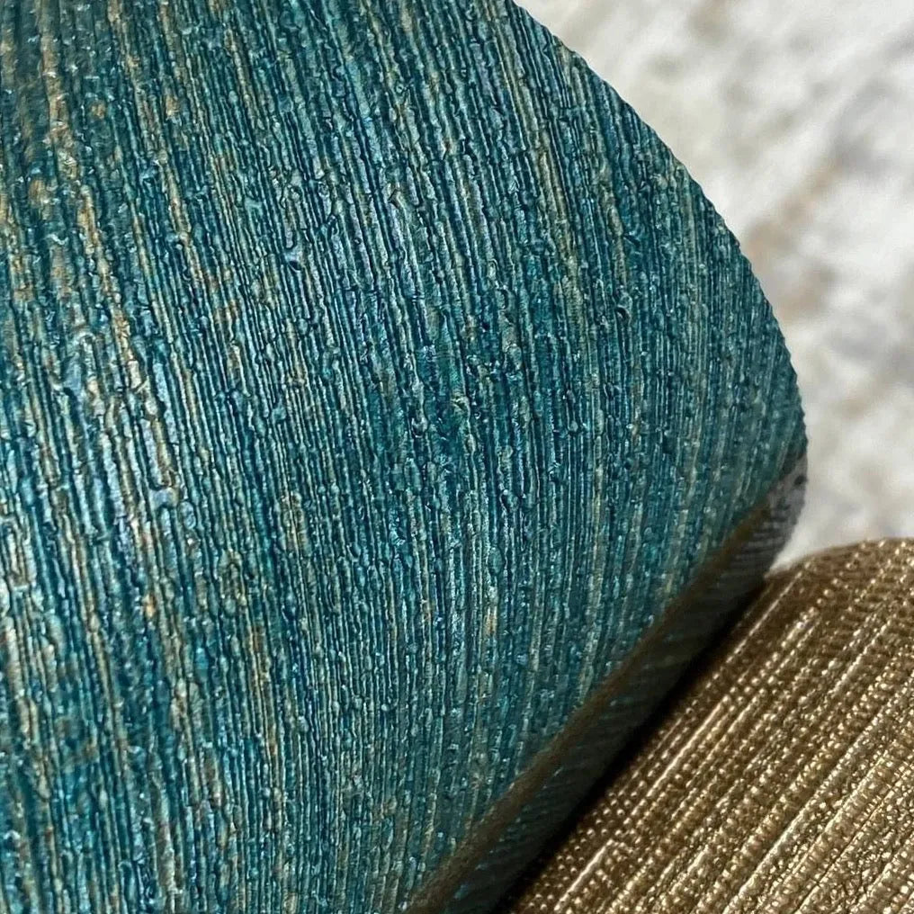 Erismann Fashion For Walls 4 10370-19 wallpaper lounge feature wall with textured teal and gold vertical ridges for a relaxed, tactile look.