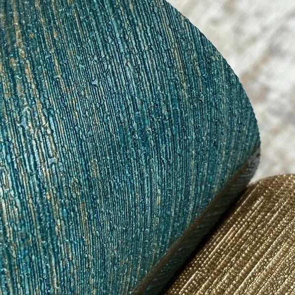 Erismann Fashion For Walls 4 10370-19 wallpaper lounge feature wall with textured teal and gold vertical ridges for a relaxed, tactile look.