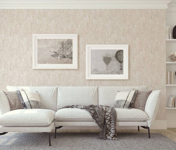 Erismann Fashion For Walls 4 10375-02 wallpaper lounge feature wall behind a light sofa with cushions and throw, two framed prints, built-in shelves, and a calm cozy mood.