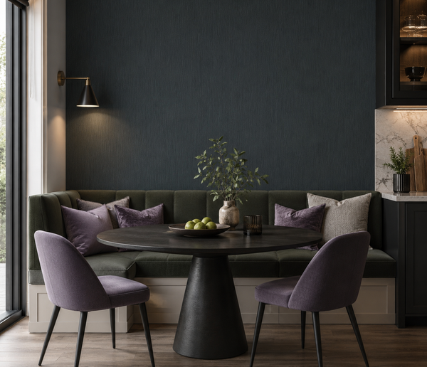 Erismann Fashion For Walls 4 10376-15 wallpaper on a lounge feature wall behind a built-in banquette, round pedestal table, two upholstered chairs, a wall sconce, open shelving, and greenery for a calm modern vibe.